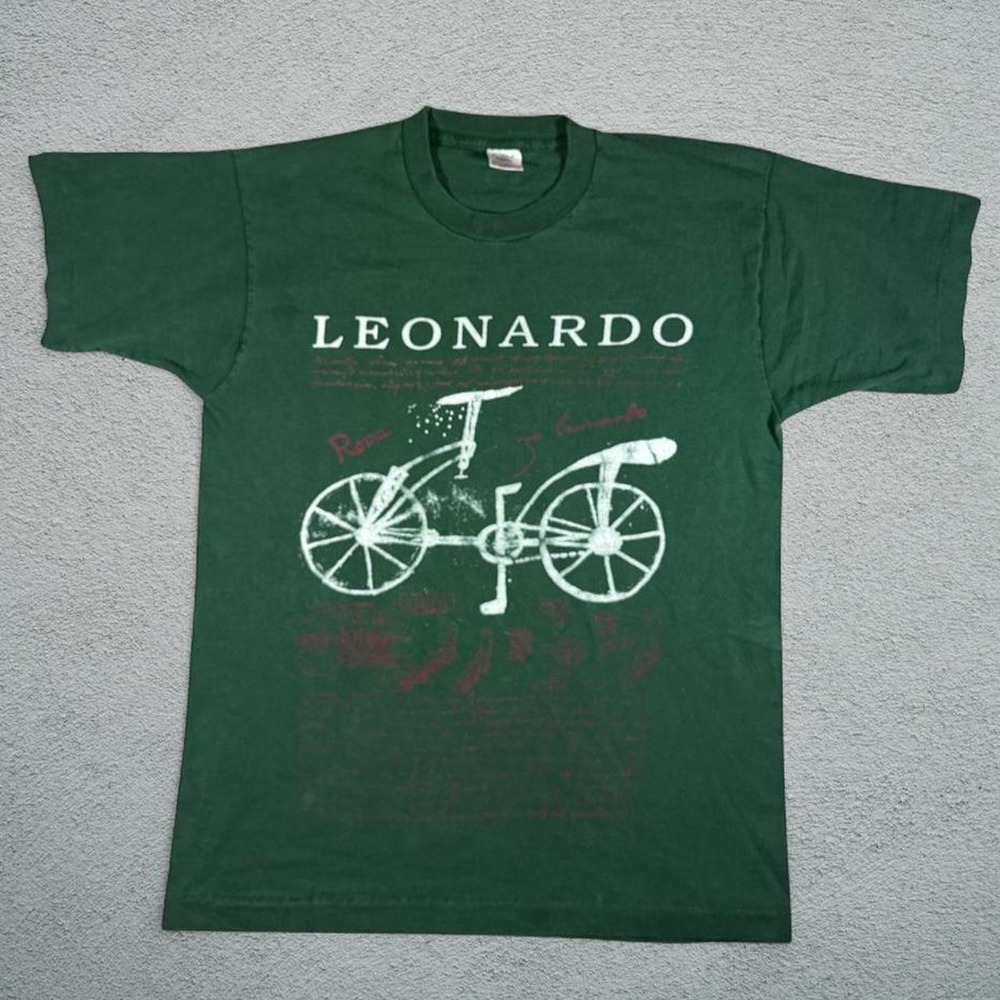Vintage 90s Fruit of the Loom Leonardo da Vinci Bicycle Tee Green Single Stitch